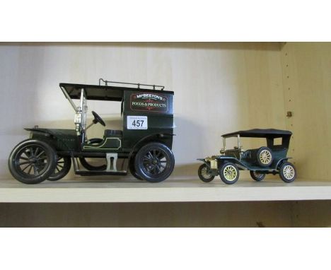 A large tin plate Model T Ford van and a Plastic Ford Model T, made in Spain.