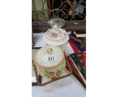 Two ceramic biscuit barrels and an oak biscuit barrel.