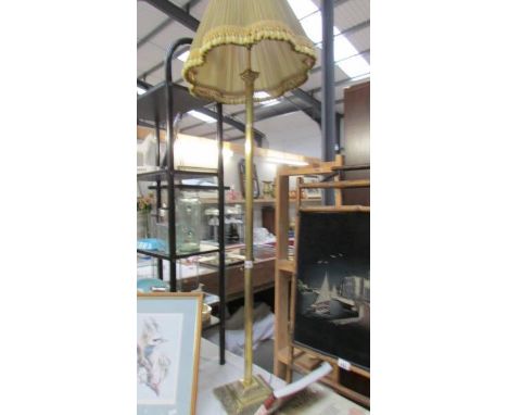 A brass Corinthian column floor standing lamp. (Collect only)