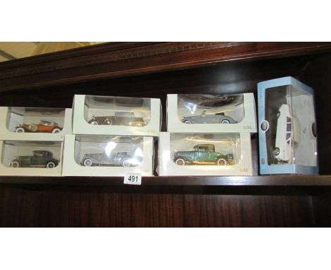 Six boxed 1/32 scale die cast model cars including Mercedes, Cadillac, etc.,