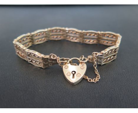 A 9ct gold fancy-link articulated panel bracelet - With partial hallmark - Length 18.5cms - Weight approx 27.8gms
Condition R