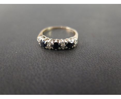 A 9ct gold sapphire and diamond ring - Hallmarked London - Ring size M 1/2 - Weight approx 2.5gms
Condition Report: Good - Wi