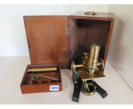 R. Field & Sons of Birmingham brass and green iron monocular microscope circa 1890 - this design won the society of Arts Desi