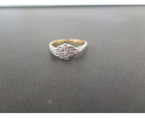 A diamond panel ring - Set with single-cut diamonds - Stamped 18ct - Ring size N - Weight approx 2.6gms
Condition Report: Goo