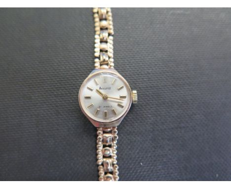 ACCURIST a ladies 21 jewel 9ct gold wristwatch - Hallmarked Birmingham - Length 18cms - Weight approx 10.9gms
Condition Repor