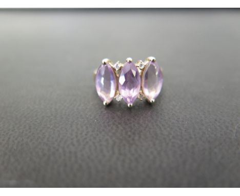 A 9ct gold amethyst and diamond dress ring - Hallmarked Birmingham - Ring size K - Weight approx 2.5gms
Condition Report: Goo