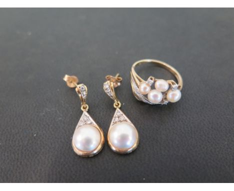A cultured pearl and diamond dress ring - Stamped 375 - Ring size O - Weight approx 2.4gms - Together with a pair of cultured