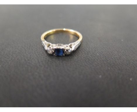 A sapphire and diamond three-stone ring - The square-shape sapphire to the single-cut diamond shoulders and plain band - Test