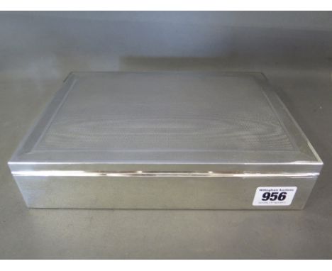 A good quality silver cigar box - Hallmarked Birmingham 1928 by A & J Zimmerman - weighted base with cedar lining, the top de