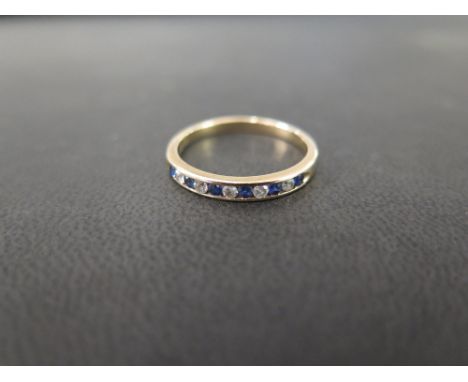 A 9ct gold sapphire and diamond channel-set ring - Hallmarked Birmingham - Ring size P - Weight approx 2.1gms
Condition Repor