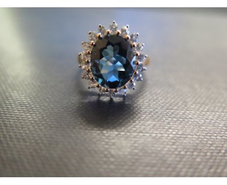 A 9ct gold topaz and white-gem cluster ring - Hallmarked Birmingham - Ring size O 1/2 - Weight approx 4.9gms
Condition Report