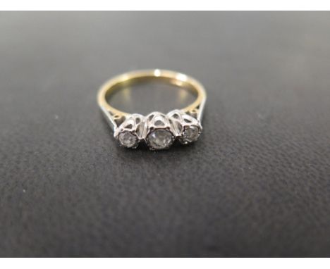 An old-cut diamond three-stone ring - Stamped 18ct - Ring size N - Weight approx 3.0gms
Condition Report: Good - With light s