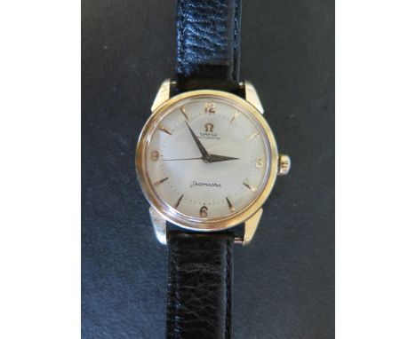 A very good Gents Omega Seamaster Automatic in a heavy 18 ct gold case - Hallmarked on lugs and inside case, lobed Omega Crow
