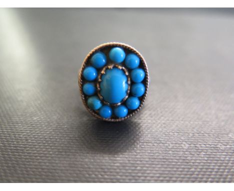 A turquoise cabochon cluster ring - Tests as 18ct gold - Ring size P 1/2 - Weight approx 7.7gms
Condition Report: Good to fai
