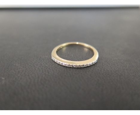 A diamond half-circle ring - Stamped 375 - Ring size Q - Weight approx 1.8gms
Condition Report: Good