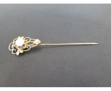 An opal and seed pearl stick pin - Stamped 14K - Length 7.5cms - Weight approx 3.9gms
Condition Report: Good to fair - With s