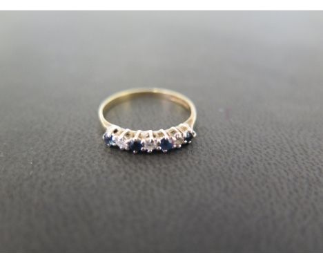 A 9ct gold sapphire and diamond seven-stone ring - Hallmarked Birmingham - Ring size L - Weight approx 1.2gms
Condition Repor