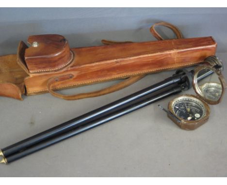An American D W Bruntons Pocket Transit Compass with tripod stand and leather case