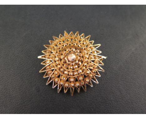 A star brooch/pendant - with faceted bead detail - Tests as 18ct gold - Diameter 4.5cms - Weight approx 22.4gms
Condition Rep
