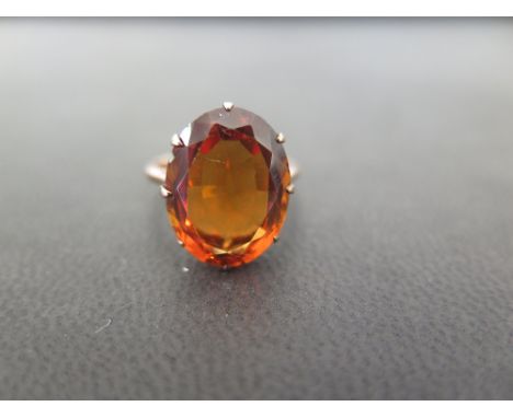 A citrine dress ring - Stamped 9ct - Ring size K - Weight approx 3.4gms
Condition Report: Good - With light scratches - Evide