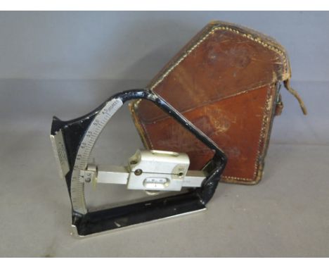 A 1929 Air Ministry Clinometer mark VI with leather case by E R Watts and Son