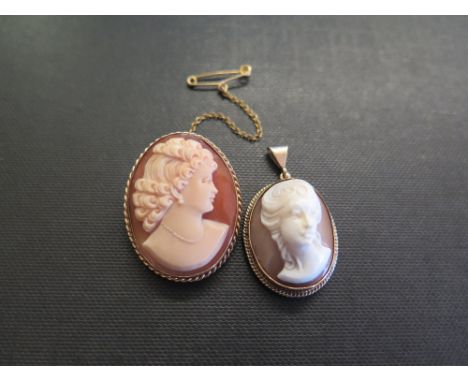 A 9ct gold shell cameo brooch - Hallmarked London - Length 3.3cms - Weight approx 6.7gms - Together with a further shell came