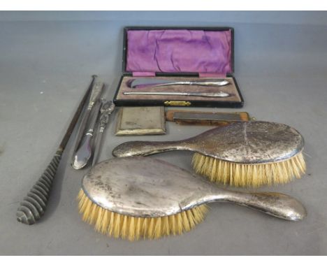 A silver handled shoe horn and button hook - boxed, four silver handled button hooks, two hair brushes with hallmarked silver