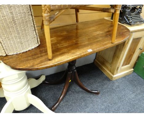 A mahogany topped console-style table