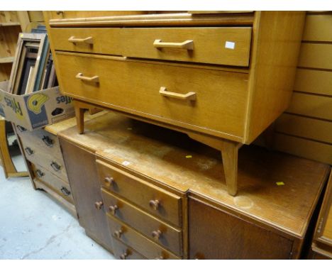 A vintage light oak breakfront sideboard together with a vintage light oak dressing table