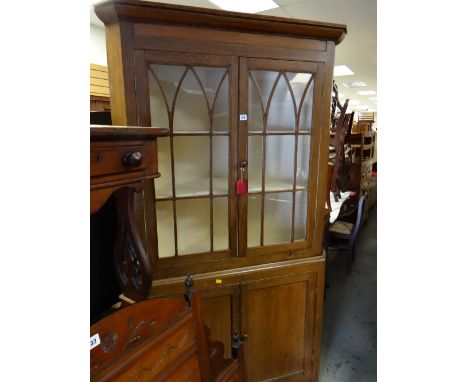 An antique light oak astragal glazed standing corner farmhouse-cupboard
