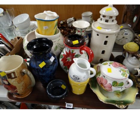 A Beswick 'Falstaff' jug, large Ewenny pottery vase, planters, ceramic lighthouse tea light etc