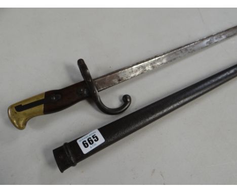 A military bayonet and scabbard