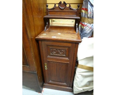 Early twentieth century mahogany carved door night cabinet with mirror & shelf back