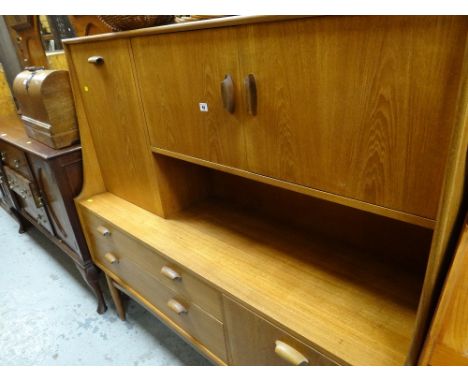 A retro G-plan light oak cupboard sideboard with pull down cupboard door & drawers