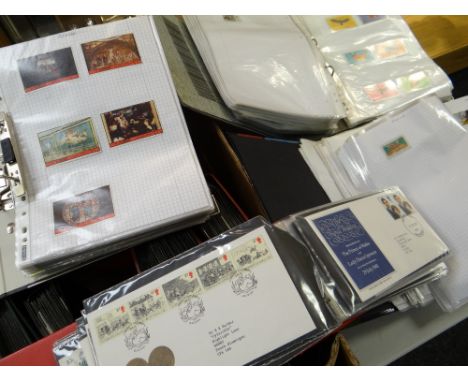 A large parcel of First Day Covers & folders of loose foreign stamps