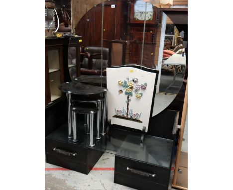 A vintage black painted large circular mirrored dressing table, fire screen & nest of three tables