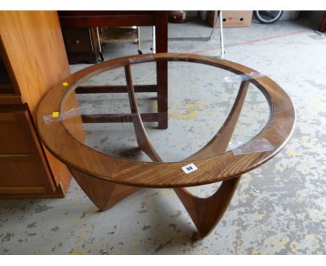 A vintage G-plan circular glass topped coffee table