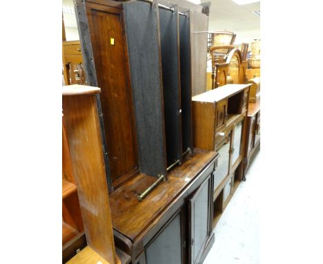 An early twentieth century rosewood chiffonier with open shelf top with brass supports