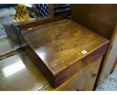 A good antique oak writing slope with compartment shelf interior