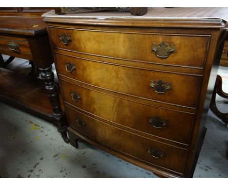 A Reprodux reproduction mahogany Georgian style bow fronted chest of four drawers