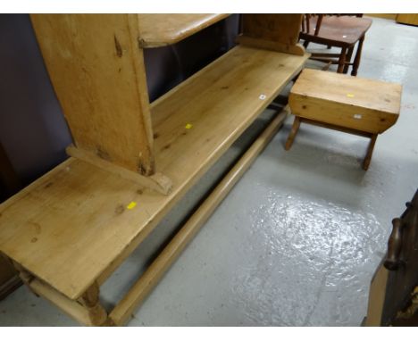 A long narrow pine coffee table together with a small pine stool. Length - 166cms, height -35cms, depth - 40cms