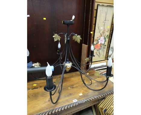 A large modern black metal &amp; brass effect five-branch ceiling light