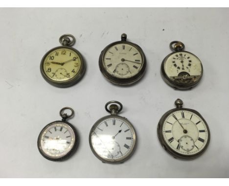 A group of 6 silver and white metal pocket watches including a military compass.
