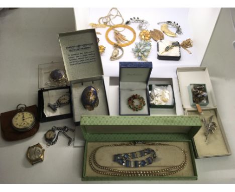 A small group of vintage costume jewellery and watches