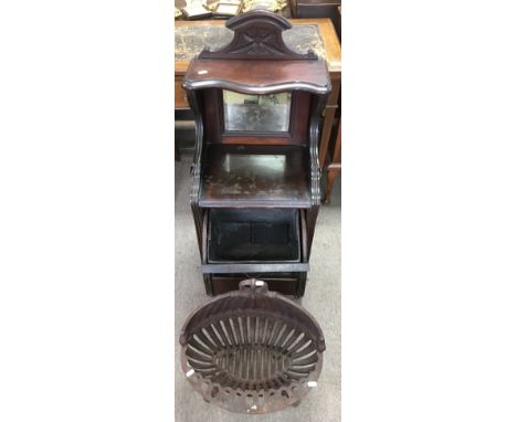 A floorstanding coalbox and an iron fire gate