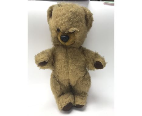 A Burbank vintage teddy bear, still has working growler.