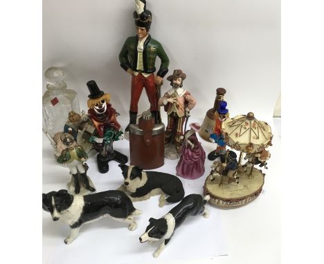 A collection of various ceramic figures and animals