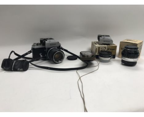 A collection of Nikon items to include a Nikon F Professional series SLR camera with a 43-86mm lens, two Nikon T viewfinders,