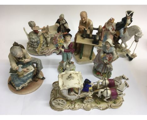 A collection of ceramic figure including a pair of porcelain Sitzendorf flower sellers, some a/f