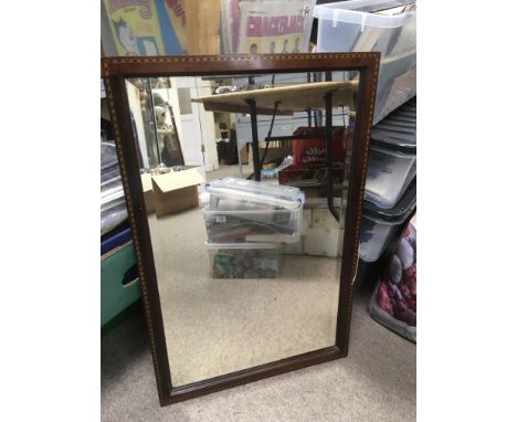 An Edwardian inlaid mahogany mirror, approx 48.5cm x 74cm.